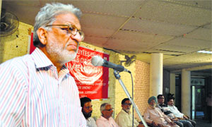 A speaker addresses members at the convention of Central Trade Unions on Thursday.