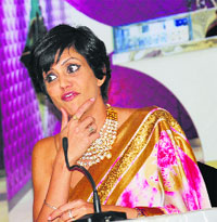 Mandira Bedi  addresses mediapersons at the launch of her saree collection in Ludhiana.