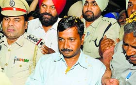 AAP convener Arvind Kejriwal arrives at the Amritsar railway station on Thursday evening.