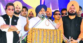 Deputy CM Sukhbir Badal addresses a rally in Batala in favour of BJP-SAD candidate Vinod Khanna on Thursday.