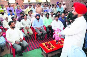 PPCC chief Partap Bajwa addresses workers in Gurdaspur.