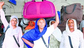 Members of the SGPC jatha leave for Pakistan in Amritsar on Thursday.