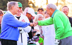 Former Masters champions Jack Nicklaus and Arnold Palmer, both of the US, fist bump as they take part in the ceremonial start of the Masters in Augusta on Thursday.