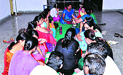 Teachers of Guru Nanak Public School hold a protest on the school premises in Bathinda on Friday