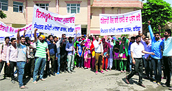 Students of Malwa College shout slogans against the Improvement Trust in Bathinda on Friday