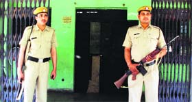 Security personnel man the centre where EVMs have been stored in Sector 14, Panchkula, on Friday.