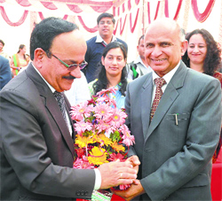Prof Balram Dogra, chief guest of Himspark 14, being welcomed during the inaugural function by Pro-VC Yoginder Verma at the CUHP in Kangra on Friday.