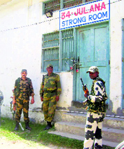 Security personnel outside the Arjun Stadium in Jind.