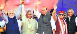 (From left) BJP PM nominee Narendra Modi, Kalyan Singh, party president Rajnath Singh, Murli Manohar Joshi and VK Singh during a rally in Lucknow. A PTI file photo