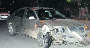 The damaged Skoda car that hit the scooter at Sector 49 on Friday night.