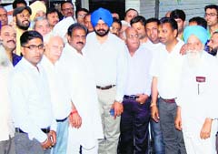 Manpreet Singh Ayali campaigns in Ludhiana on Saturday. A Tribune Photograph
