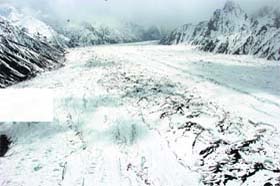 An IAF Cheetah helicopter makes its way across the vast, icy expanse of the Siachen Glacier in inclement weather