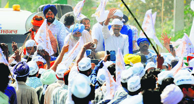 AAP chief Arvind Kejriwal during a roadshow in support of HS Phoolka in Ludhiana on Saturday.