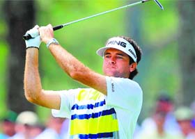 Bubba Watson hits a shot on the 17th hole during the second round of the Masters Tournament in Augusta on Friday