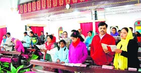 Devotees attend a prayer session at a church to mark Palm Sunday in Mussoorie on Sunday.