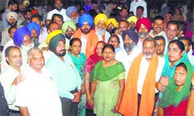 SAD-BJP candidate Manpreet Singh Ayali with his supporters in Ludhiana.