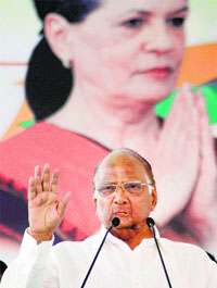 Union Agriculture Minister Sharad Pawar addresses a rally.