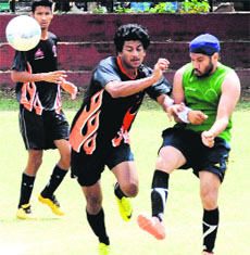 Players of Minerva Sharks and Baichung Bhutia Club in action during a match at the Football Stadium, Sector 17, Chandigarh.