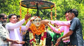 People pay floral tributes to Bhim Rao Ambedkar on his 123rd birth anniversary in Gurgaon on Monday.