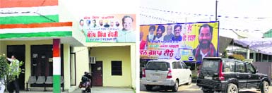 The Congress election office wears a deserted look; and (right) the SAD-BJP poll office in Jalandhar on Monday. Photo: Sarabjit Singh