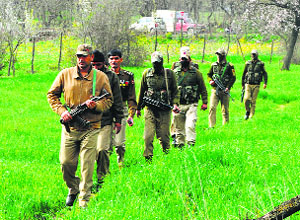 Security forces cordoned off the area in Khrew village after the militant attack on Sunday.