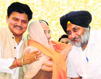 Giani Zail Singh's daughter Joginder Kaur, Sukhbir Badal and Anil Bhola in Bathinda on Monday. Tribune photo
