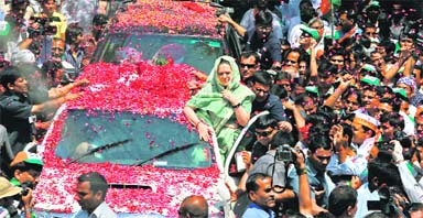 Congress chief Sonia Gandhi is showered with rose petals on her arrival to file her nomination at Rae Bareli. A file photo