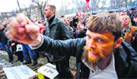 Pro-Russian protesters attend a rally in front of the seized office of the state security service in Luhansk on Monday. AFP