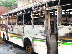 The bus set on fire by the mob in Amritsar on Tuesday. photo: Vishal Kumar