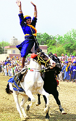Nihangs display their skills on the concluding day of the Baisakhi Mela at Talwandi Sabo on Tuesday