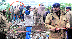 The police cordon off the spot (encircled) where five-year-old Khushpreets body was found in Phase X, Mohali