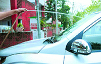 A Sector 28 resident washes his car in Chandigarh on Tuesday