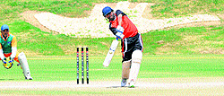 A batsman of the Ahmedabad zone hits a shot during a match of the Bank of India Inter-Zone Cricket Tournament at the Cricket Stadium, Sector 16 , Chandigarh, on Tuesday