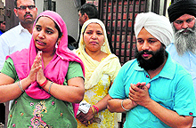 Khushpreet's father Lakhbir Singh and mother Kulwinder Kaur outside the court after the verdict