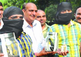 Two wanted criminals in a recent double murder case in Bawana in police net, in New Delhi on Tuesday