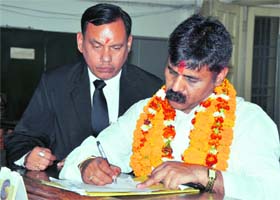 Taking a chance: Independent candidate Brahm Dev Jha file his nomination parpers for the Lok Sabha elections at the District Magistrates office in Dehradun on Tuesday
