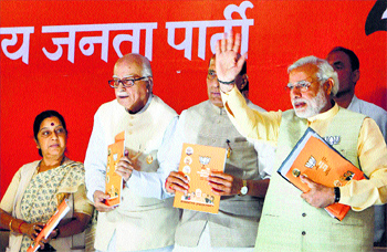Secularism was not mentioned in the BJP’s manifesto. The party’s prime ministerial candidate Narendra Modi (R), party president Rajnath Singh (C), and senior leaders Lal Krishna Advani and Sushma Swaraj at the release of its election manifesto