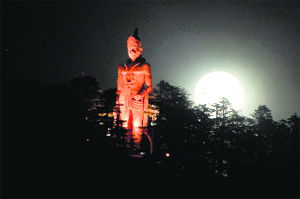 The 108-foot-tall Hanuman statue at the top of the Jakhu Hill on the eve of Hanuman Jayanti in Shimla on Monday night, that had a full moon.