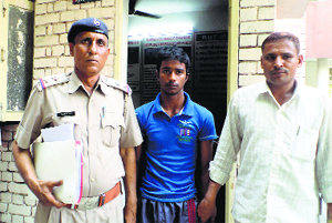 Murder accused Raja in police custody.