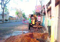 A portion of the Pakhowal road that was dug up in an illegal manner by the staff of a private company in Ludhiana on Tuesday. a tribune photograph