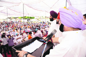 Congress candidate Captain Amarinder Singh addresses a rally at Bishambarpura near Amritsar on Wednesday.