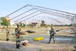 Security personnel guard the venue for the BJP prime ministerial candidate Narendra Modis rally that will take place on April 24 in Bathinda.