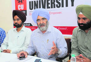 Vice-Chancellor of Chandigarh University Dr RS Bawa addresses mediapersons in Bathinda on Wednesday. 