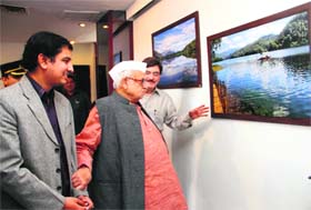 Appreciating art: Governor Aziz Qureshi along with Maanas Lal during the latters photo exhibition in Dehradun on Wednesday