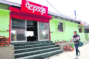 Work in progress on restaurant "Petpooja" in Shimla on Wednesday. 