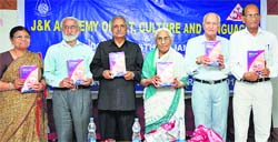Dignitaries release the special issue of Sheerza on the life and works of Ramnath Shastri in Jammu. Tribune photo: Inderjeet Singh