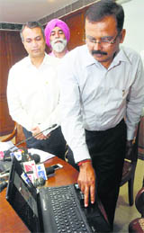 VK Singh, CEO, inaugurates a cellphone application in Chandigarh on Wednesday.