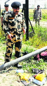 BSF DIG MF Farooqui with the seized drugs on the border in Amritsar on Wednesday.