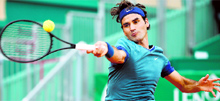 Roger Federer returns the ball to Radek Stepanek during the Monte Carlo Masters in Monaco on Wednesday