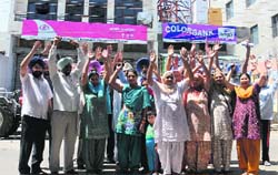 Residents of Harbans Nagar protest against the MCB in Bathinda on Thursday. Tribune photo